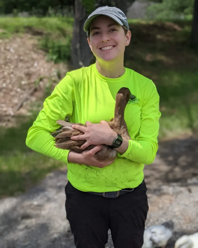 person holding a duck